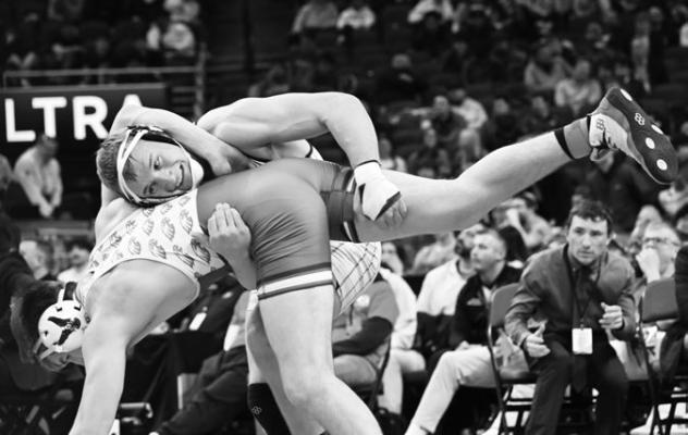 CENTRAL VALLEY’S WILLIAM POKORNY works to take Southern Valley’s Hayden Lans to the mat during the Class D championship match at 165 pounds. Pokorny beat Lans by a 14-2 major decision. Photo by Michael Happ
