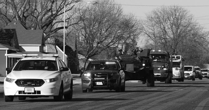 THE ST. PAUL HIGH SCHOOL GIRLS WRESTLING TEAM was escorted out of town by members of the St. Paul Police Department, the Howard County Sheriff’s Office, and the St. Paul Volunteer Fire Department as they made their way to the state wrestling tournament on Tuesday. The convoy took to the streets at 9:30 a.m. Photo by Michael Rother