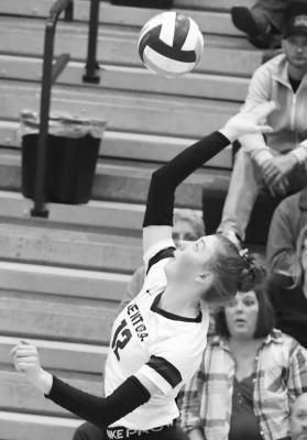 CENTURA senior Sydney Davis goes for the kill from the right pin during the second set of Thursday’s conference final match against St. Paul.