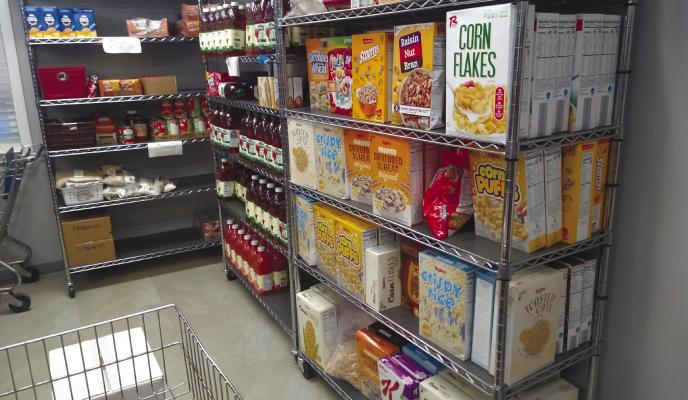 THE HOWARD GREELEY FOOD PANTRY in St. Paul uses monetary donations to purchase many staples for income qualifying individuals and families. throughout the year Photo by Michael Rother