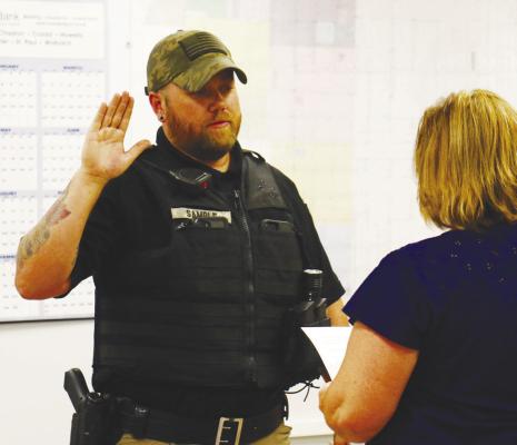 Sample joins municipal police department