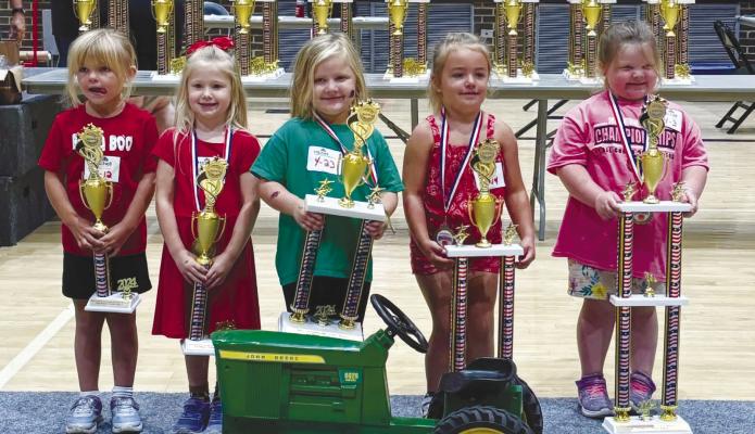 LETA RASMUSSEN is a nationally ranked pedal tractor puller following the 2024 National Pedal Pull Championships at the Corn Palace in Mitchell, South Dakota on Saturday, September 28th. Pictured at the awards ceremony for the girls’ four-year-olds division are (left to right) Izabella Boettcher, Minnesota (5th Place); Leta Rasmussen, Nebraska (4th Place); Blayke Simonsen, South Dakota (3rd Place); Alice Gruber, Nebraska (2nd place); and Sadie Felty, Kansas (1st place). Courtesy Photo