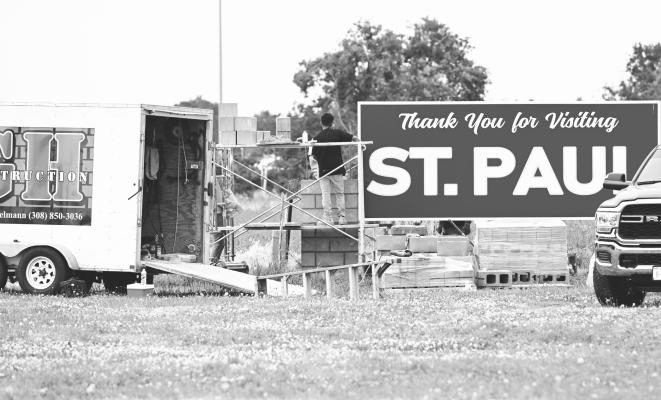 WORKERS with GH Construction in Grand Island were busy on Monday constructing the surround to the City of St. Paul’s north welcome sign along United States Route 281. When completed, the north sign is expected to match the city’s south welcome sign, which was completed in 2023. Photo by Michael Happ