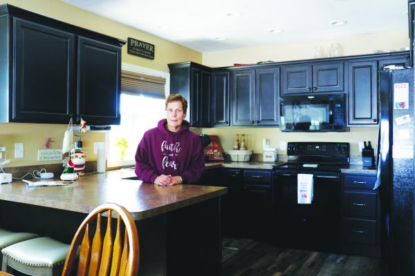 ST. PAUL resident Judy Dietz is pictured in her kitchen at the Jacobsen-Greenway-Dietz Funeral Home in St. Paul, where she does her baking. (Michael Rother)