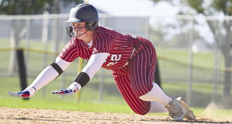 CENTURA/CENTRAL VALLEY’S EMMA PARR gave the Diamonds the spark they needed when she led off the bottom of the fifth inning with a hit. Above, Parr steals second base at the Smith Softball Complex in Hastings during Friday’s championship game. Photos by Michael Happ