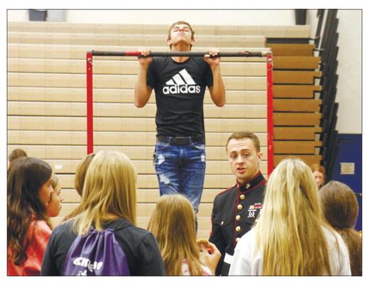 THE UNITED STATES MARINE CORPS had one of the more popular booths at the St. Paul Public Schools Career Fair last Wednesday. Around 200 students participated in the event. Photo by Michael Rother