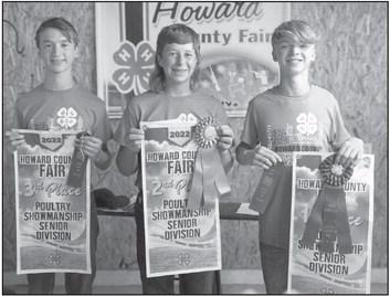 EARNING HONORSfor senior poultry showmanship at the 2022 Howard County Fair Small Animal Show were Gabe Rief, with third place, Mason Janda, with second place, and Jacob Rief, who was the champion.