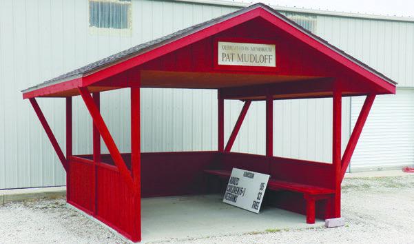 VOLUNTEERS with the American Legion, Sons of the American Legion, and American Legion Baseball restored the Pat Mudloff Memorial gate shake at Grover Cleveland Alexander Field in St. Paul this month. Photo by Michael Rother
