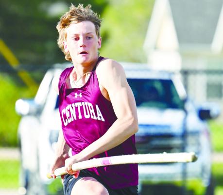 CENTURA’S WYATT DVORAK sprints down the runway in the boys’ pole vault during last Friday afternoon’s LouPlatte Conference track and field meet in Central City. Dvorak placed fourth in that event, clearing 12-06 for the hardware. Photos by Michael Happ
