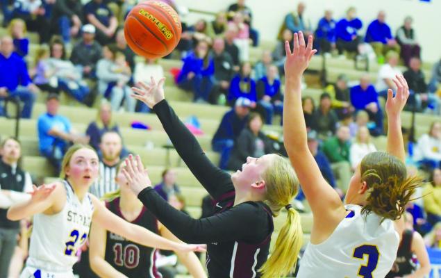 CENTURA’S KYRA WOODEN throws up a shot during the third quarter of last Tuesday’s game between the Centurions and the St. Paul Wildcats. Wooden finished the game with thirteen points. Photos by Michael Happ