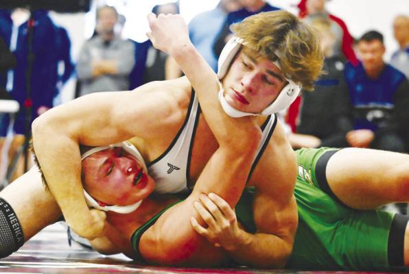 ALEX MEINECKE rolled to a district title on Saturday at the District C-3 Meet at Centura High School. Meinecke pinned two of his opponents early in the meet, including Aiden Zegar of Columbus Scotus. Photos by Michael Happ
