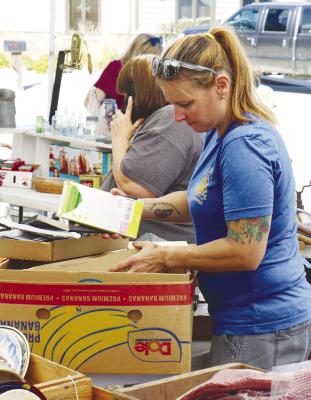 SHOPPERS browse items for sale at the home of Alice Osterman-Davis during the 2024 Junk Jaunt. This year’s Junk Jaunt is once again expected to bring large crowds to the area later this month. File Photo