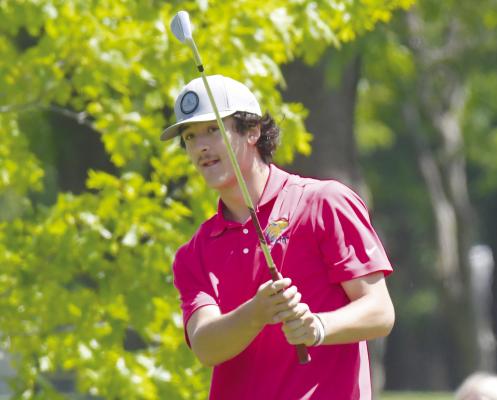 RYDER ANDERSON chips on to the tenth green during last week’s NSAA Class C State Golf Tournament. Anderson finished the tournament sitting tied for twenty-fourth. Photo by Michael Happ