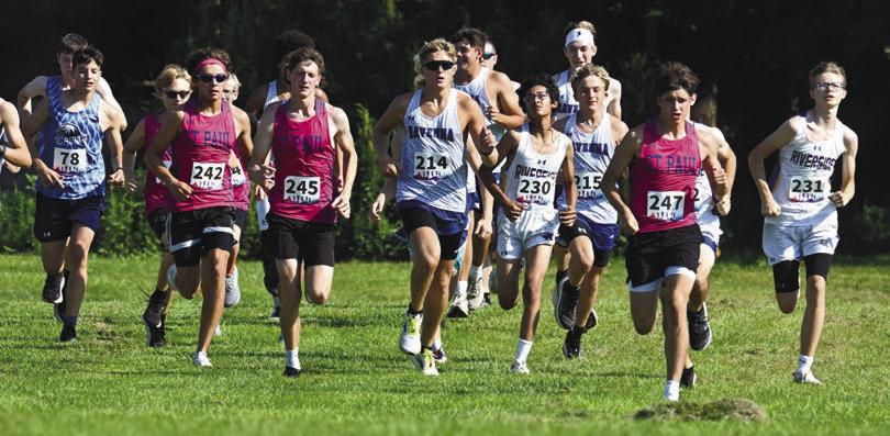 ST. PAUL’S ELI SLADEK fights for position at the start of last week’s boys’ race during the St. Paul Cross Country Invite. Photos by Michael Happ