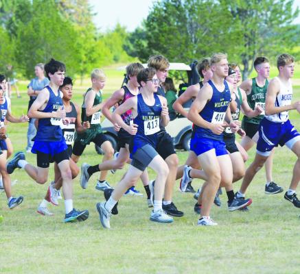 ST. PAUL’S Roman Lentz, Garrett Snyder, and Max Swanson jockey for position at the start of last week’s Bison Invite south of Central City. St. Paul had a strong showing at the Bison’s annual meet. (Michael Happ)