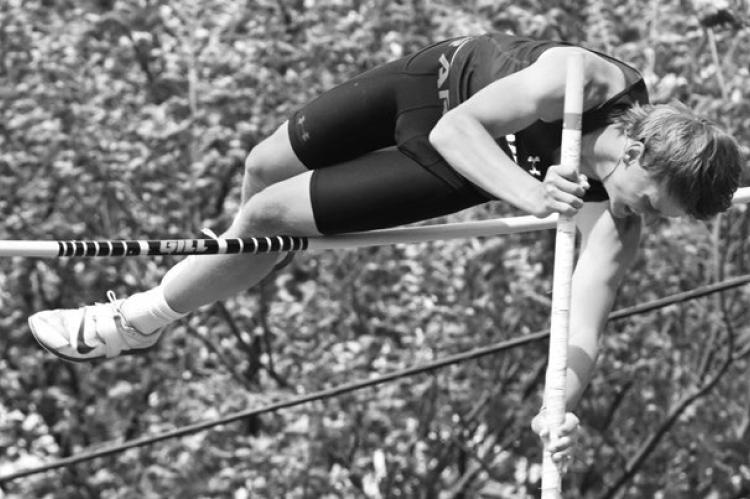 CENTURA’S WYATT DVORAK attempts to clear the bar during last week’s boys’ pole vault at the Class C-6 Meet at Boone Central. Dvorak placed second in that event with a vault of 12-08. Photos by Michael Happ