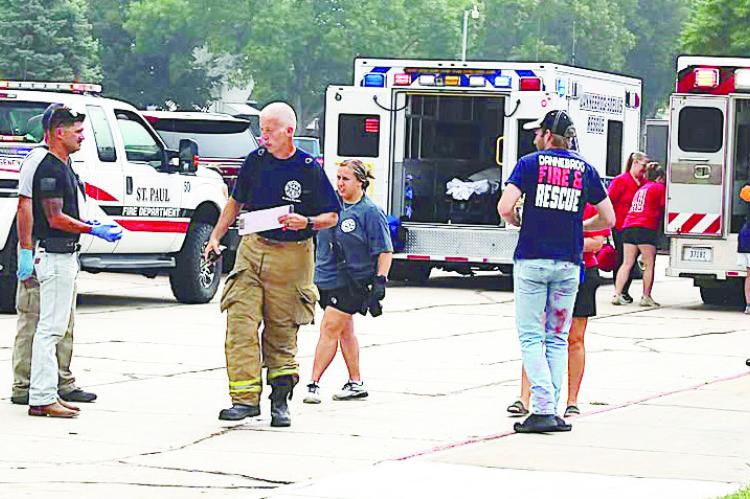ST. PAUL FIRE CHIEF MIKE BECKER speaks with first responders during Saturday morning’s mock mass casualty incident drill at St. Paul Public Schools. A variety of first responders from across the county participated in the event. Courtesy Photo