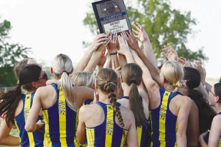 MEMBERS of the St. Paul girls’ track team secured the District C-6 team title during last Thursday’s district meet at Boone Central High School. The Wildcats scored 105 points to top the leaderboard, beating the girls from Nebraska Christian by six points. Photos by Jordan Coslor