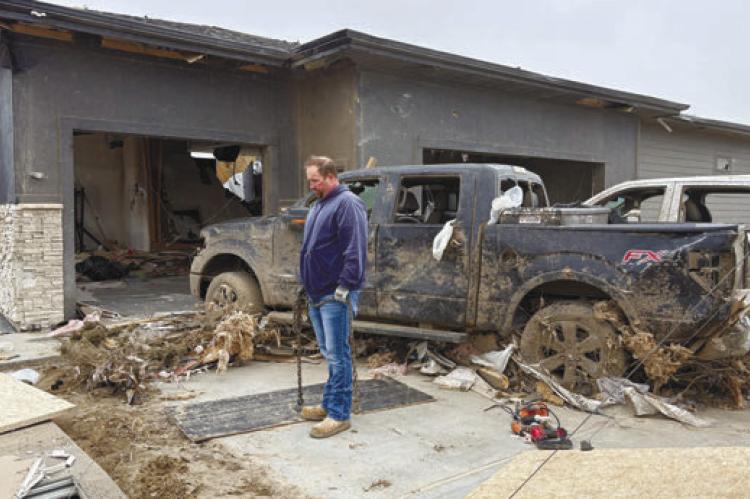 FOLLOWING AN EF3 TORNADO that damaged four homes in a subdivision north of St. Libory on May 17th, volunteers and donations have poured in from across the area and state to assist the victims in the recovery. Courtesy Photo