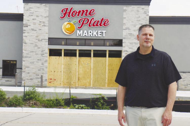 BLAKE SCHWARTZ is pictured out front of the new Home Plate Market in St. Paul. Schwartz was selected as the grand marshal of this year’s GCA Days celebration. Photo by Michael Rother