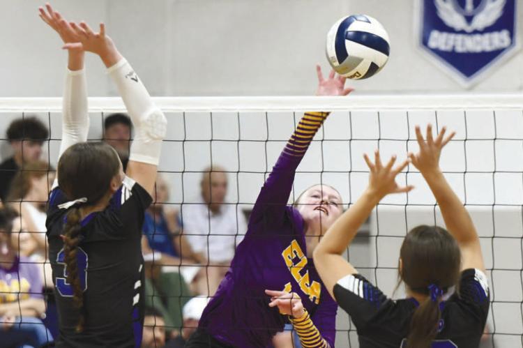 CHELSI MCKOSKI goes for a kill against Nebraska Christian’s defense during last week’s triangular with the Eagles and Gibbon. Elba beat Gibbon and took a set from Nebraska Christian. Photos by Jordan Coslor