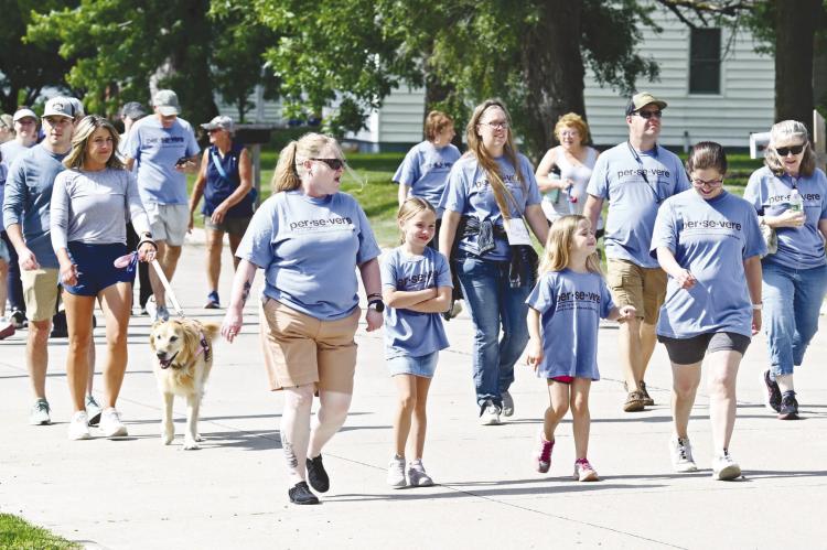 AROUND 300 PEOPLE participated in the Central Nebraska Walk of Hope’s walk on Saturday morning in St. Paul. Participation this year was up from the 225 that walked in 2025. Photos by Michael Happ