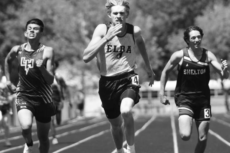 ELBA’S GARRETT KASLON paced the field of twenty-three runners in the boys’ 400-meter dash at Wednesday’s District D-5 Track Meet. Kaslon won the race in 51.80 to qualify for the state track meet. Photos by Jordan Coslor