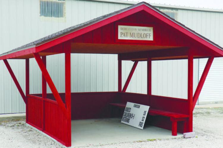 VOLUNTEERS with the American Legion, Sons of the American Legion, and American Legion Baseball restored the Pat Mudloff Memorial gate shake at Grover Cleveland Alexander Field in St. Paul this month. Photo by Michael Rother