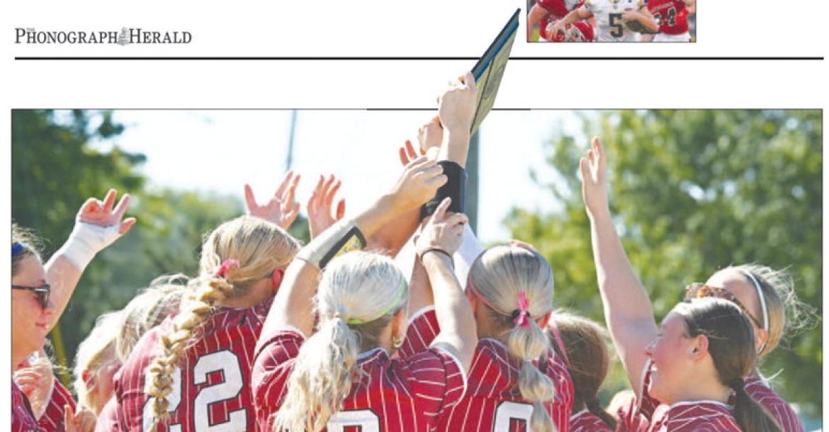 MEMBERS OF THE CENTURA/CENTRAL VALLEY SOFTBALL TEAM hoist the District C-5 championship plaque on Saturday afternoon following the Diamonds’ second victory of the championship series against Raymond Central. The Diamonds are scheduled to open state tournament play on Wednesday in Hastings. Photos by Michael Happ