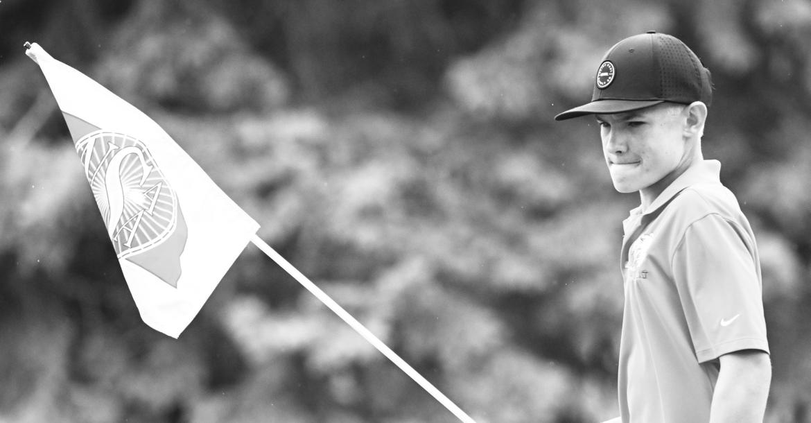 CASEN KAVAN studies the lay of the green during his final nine holes of the NSAA Class C State Golf Championships last week. Kavan had a strong back nine on Saturday, allowing the sophomore to place ninth at the state meet. Photo by Michael Happ