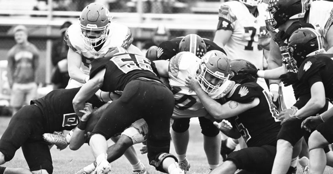 ST. PAUL’S COLTON KUSZAK fights for yards during the second half of last week’s game against Doniphan-Trumbull. Following a lightning delay that postponed Friday night’s game against the Cardinals to Saturday, St. Paul beat Doniphan-Trumbull 36-12. Photos by Michael Happ