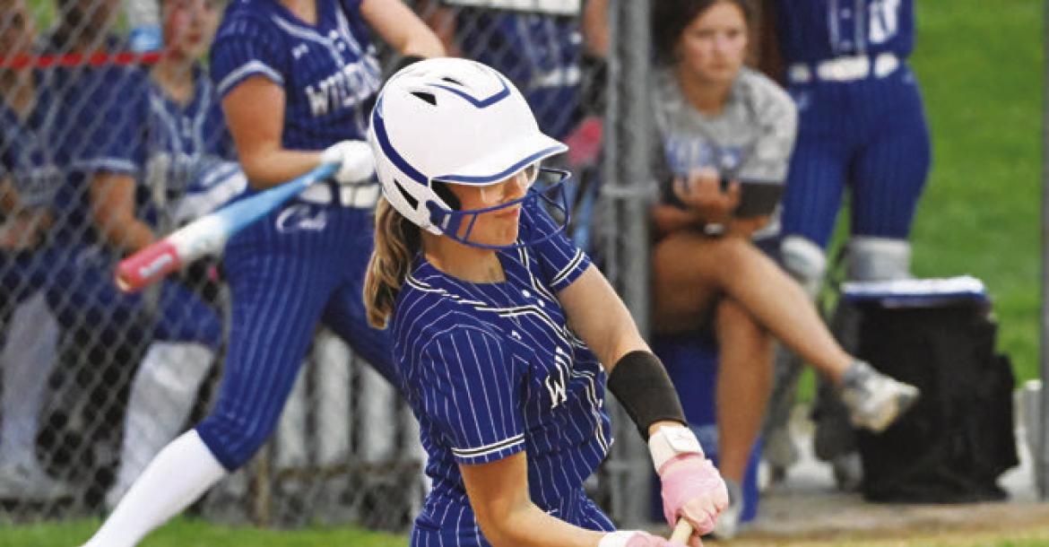 AVERIE PATRICK connects with a pitch and drives the ball to the outfield for a hit in St. Paul’s 7-4 victory over O’Neill last Thursday evening. Photos by Michael Happ