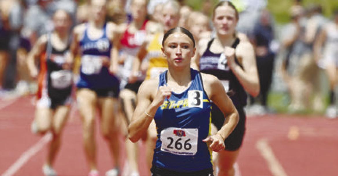 KAMDEN SACK set the pace in the Class C girls’ 800-meter run on Saturday. Sack finished the race sitting in second at 2:19.13.