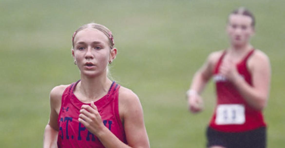 JILLIAN WELLS was one of three Wildcat runners on the girls’ side of the meet to set new personal bests at the Tom Dickey Invite in Albion. Photo by Michael Happ