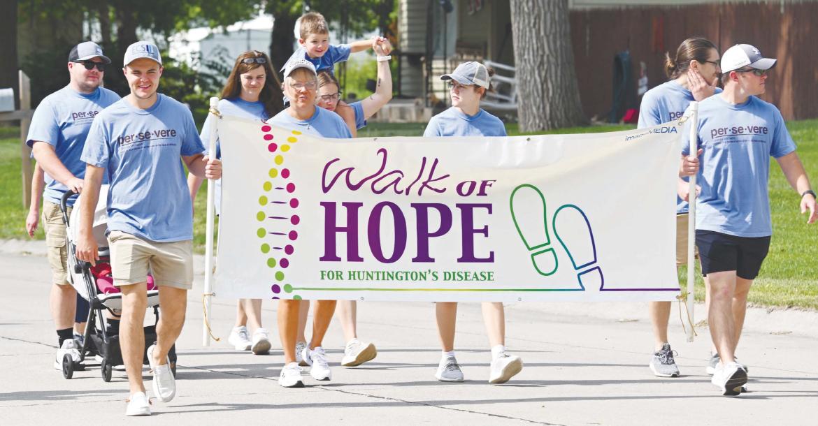 THE TWELFTH ANNUAL WALK OF HOPE for Huntington’s disease took to the streets of St. Paul on Saturday morning, marking the second time the event was held in Howard County. A large crowd participated in the event, which was held at the Sts. Peter and Paul Catholic Church Parish Life Center. Photo by Michael Happ