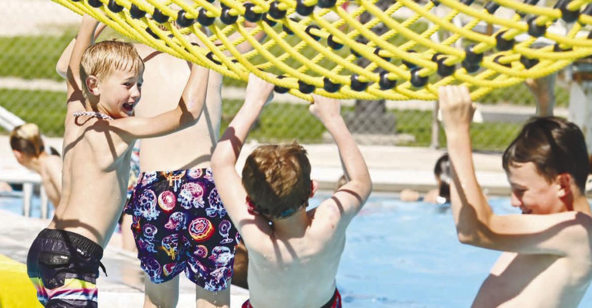 THE ST. PAUL SWIMMING POOL was the place to be over the weekend. Large crowds flocked to the municipal pool during its first weekend of the season, with attendance on Sunday hitting a high as kids and families attempted to beat the late-May heat. Photo by Michael Happ