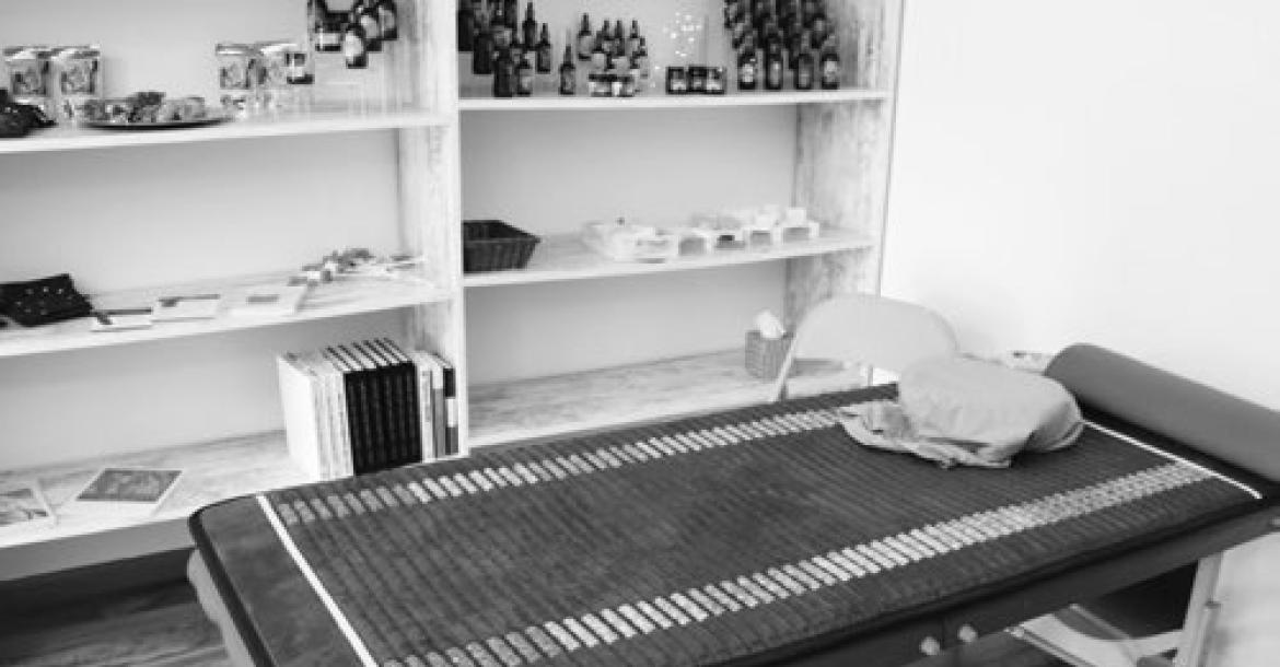 ALTERNATIVE THERAPIES are also offered at Running Wolf Originals. Pictured is an AO Infinity Mat, a wellness device marketed as using pulsed electromagnetic fields, infrared heat, and mineral stones to promote relaxation, improve sleep, and support circulation.