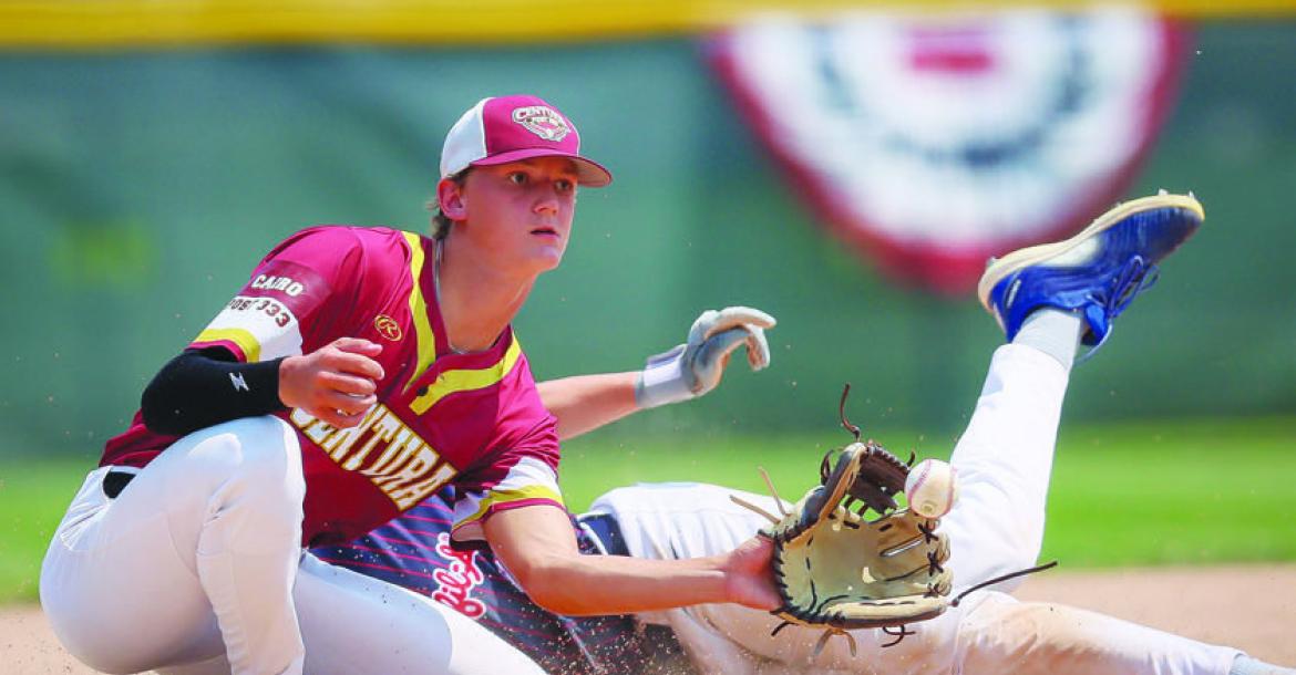 WYATT DVORAK catches a ball at third base, attempting to tag out a Lincoln Lutheran baserunner in Centura’s 11-5 win last Monday. Dvorak finished the game with one hit. Photo by Jeromy Vauble