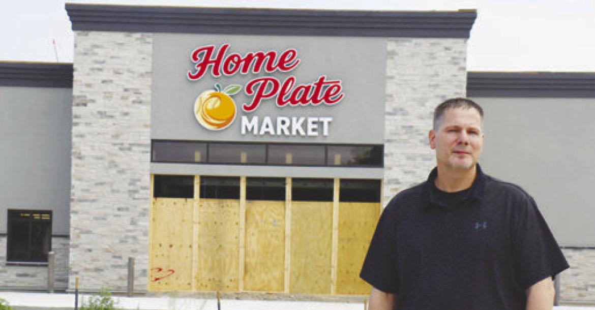 BLAKE SCHWARTZ is pictured out front of the new Home Plate Market in St. Paul. Schwartz was selected as the grand marshal of this year’s GCA Days celebration. Photo by Michael Rother