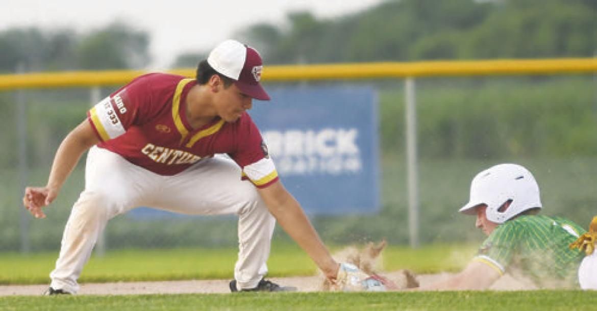 CHRISTIAN IRONHORSE attempts to tag out Central City’s Oliver Herman at second base.