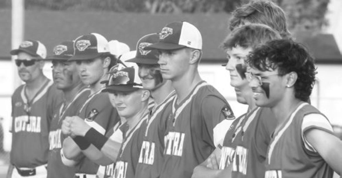 THE CENTURA SENIORS stand on the first base line as they are announced ahead of their game with Central City.