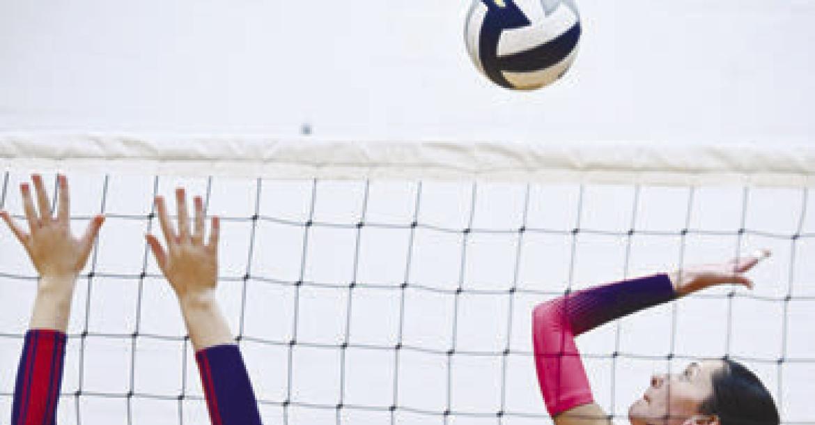 JARAHLYNN MORROW goes for a kill against a High Plains defender last Tuesday.