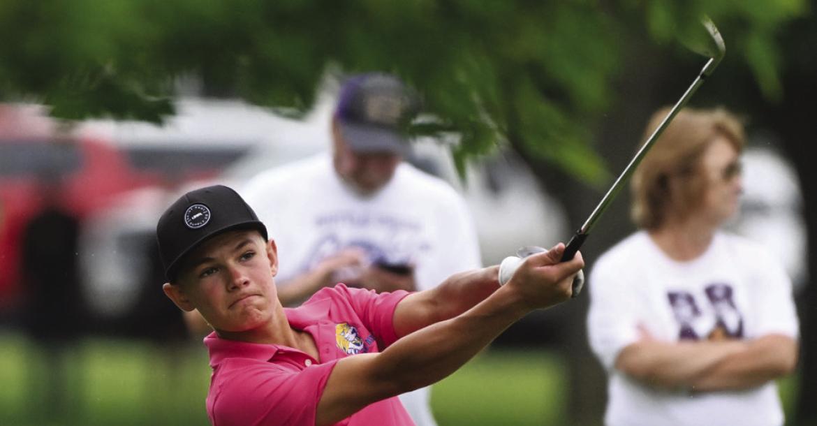 CASEN KAVAN takes a shot from the fairway on the sixteenth hole of his round last week.