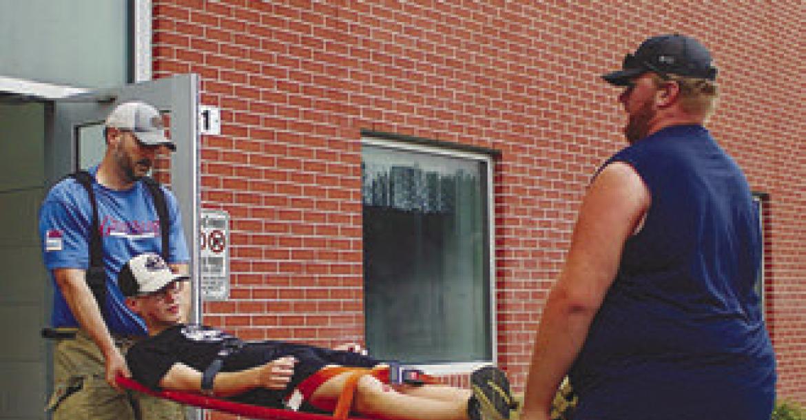 FIRST RESPONDERS from across St. Paul and Howard County participate in a mass casualty incident training exercise on Saturday. See Highlights for more details. Courtesy Photo