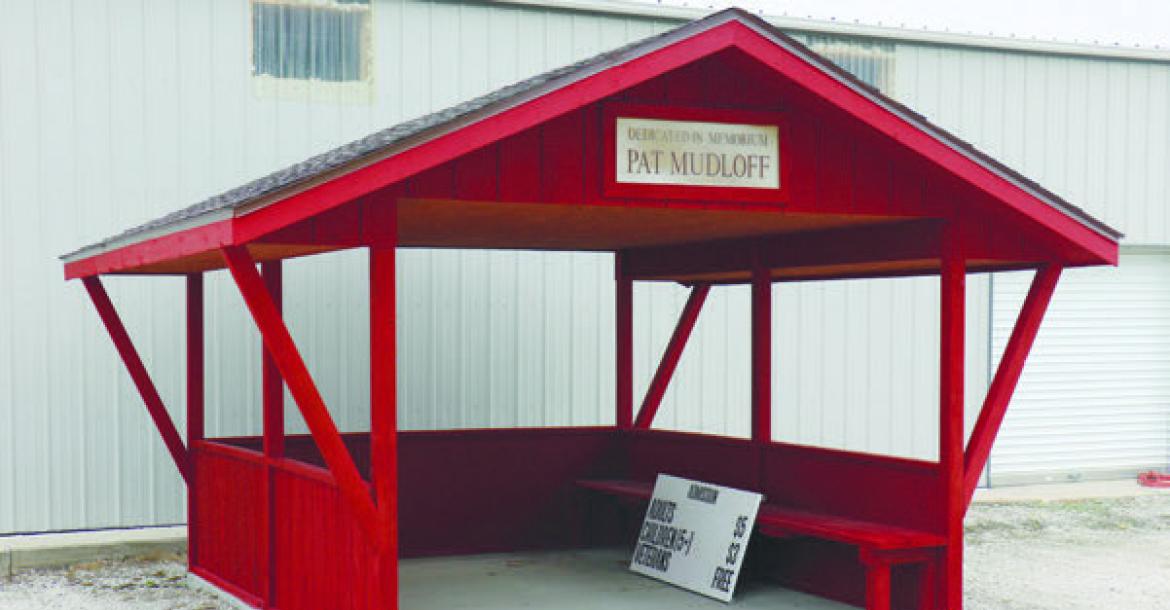 VOLUNTEERS with the American Legion, Sons of the American Legion, and American Legion Baseball restored the Pat Mudloff Memorial gate shake at Grover Cleveland Alexander Field in St. Paul this month. Photo by Michael Rother