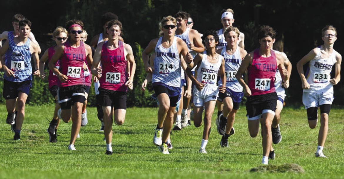 ST. PAUL’S ELI SLADEK fights for position at the start of last week’s boys’ race during the St. Paul Cross Country Invite. Photos by Michael Happ